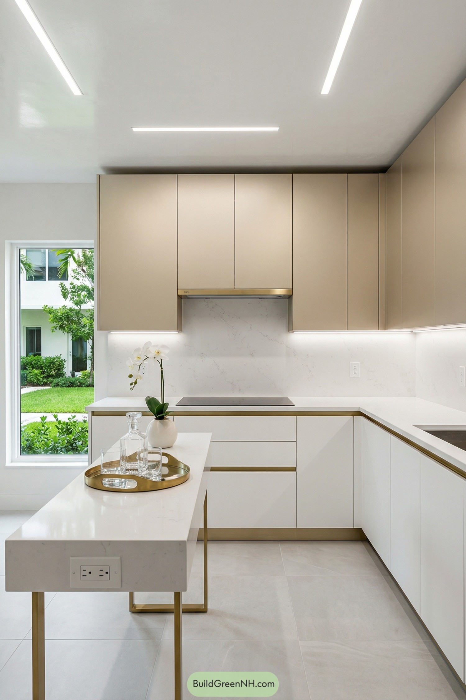 Bright minimalist kitchen with beige cabinets white counters and brass accents