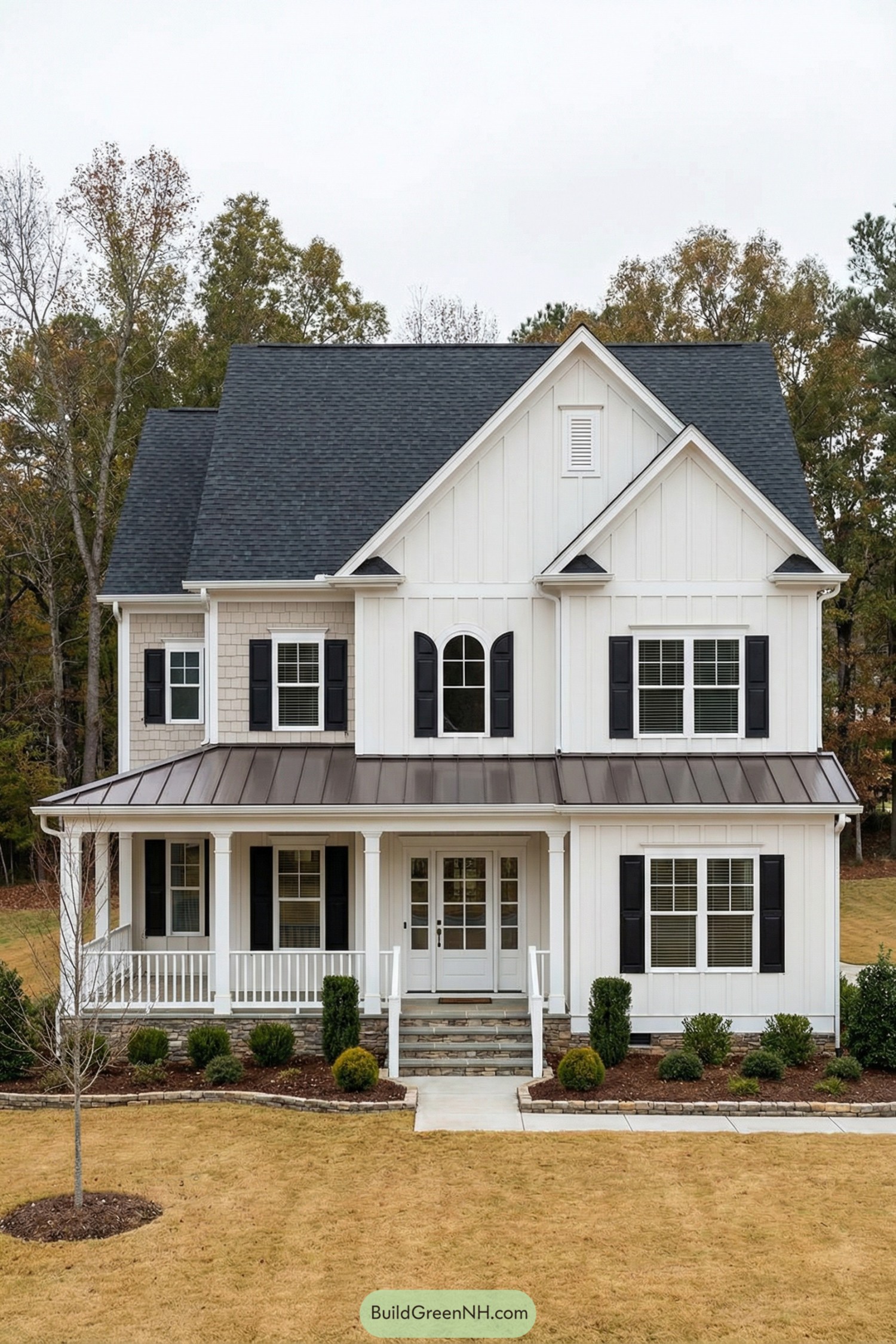 White two story house with black shutters and covered front porch