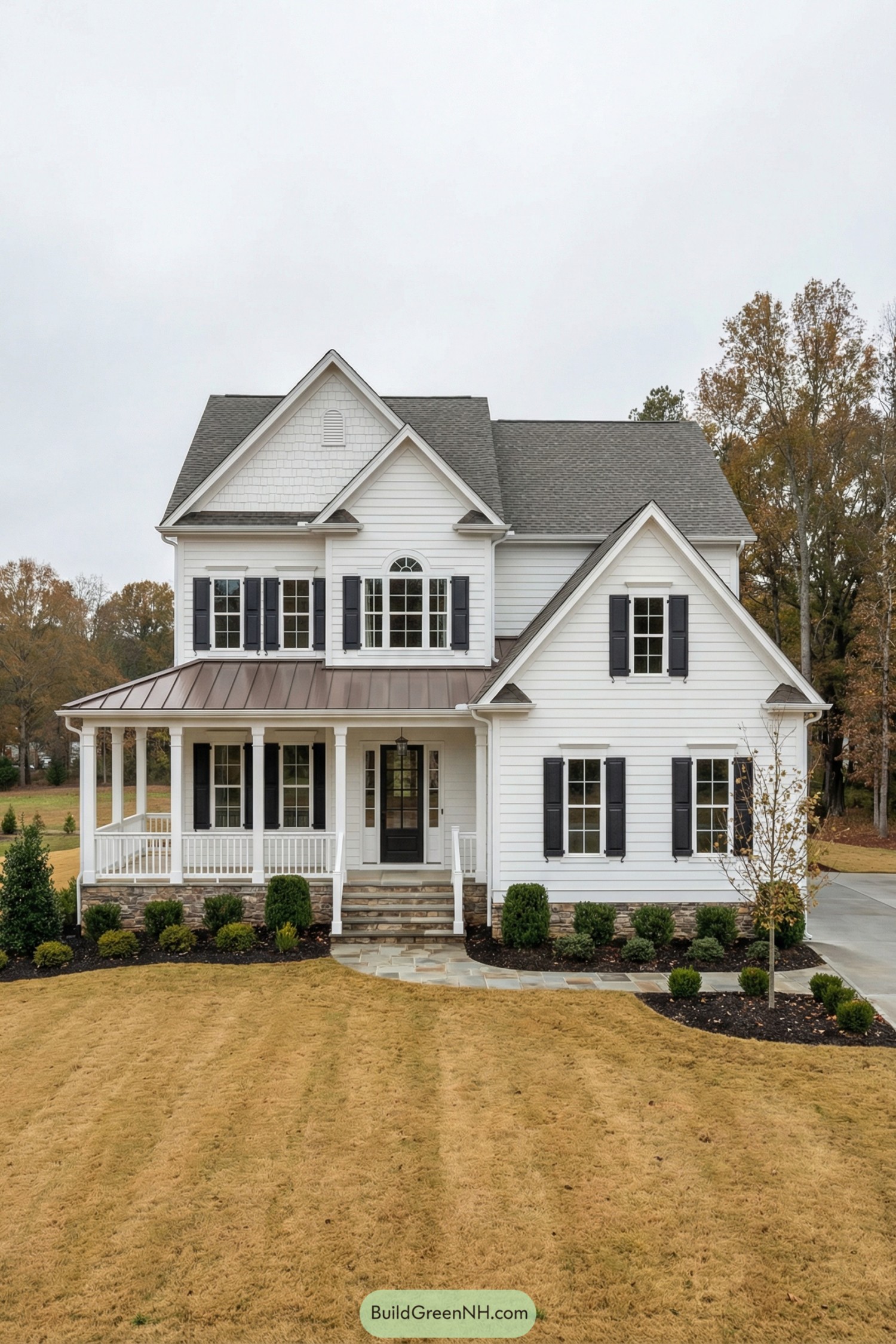 White two story house with black shutters and wraparound front porch