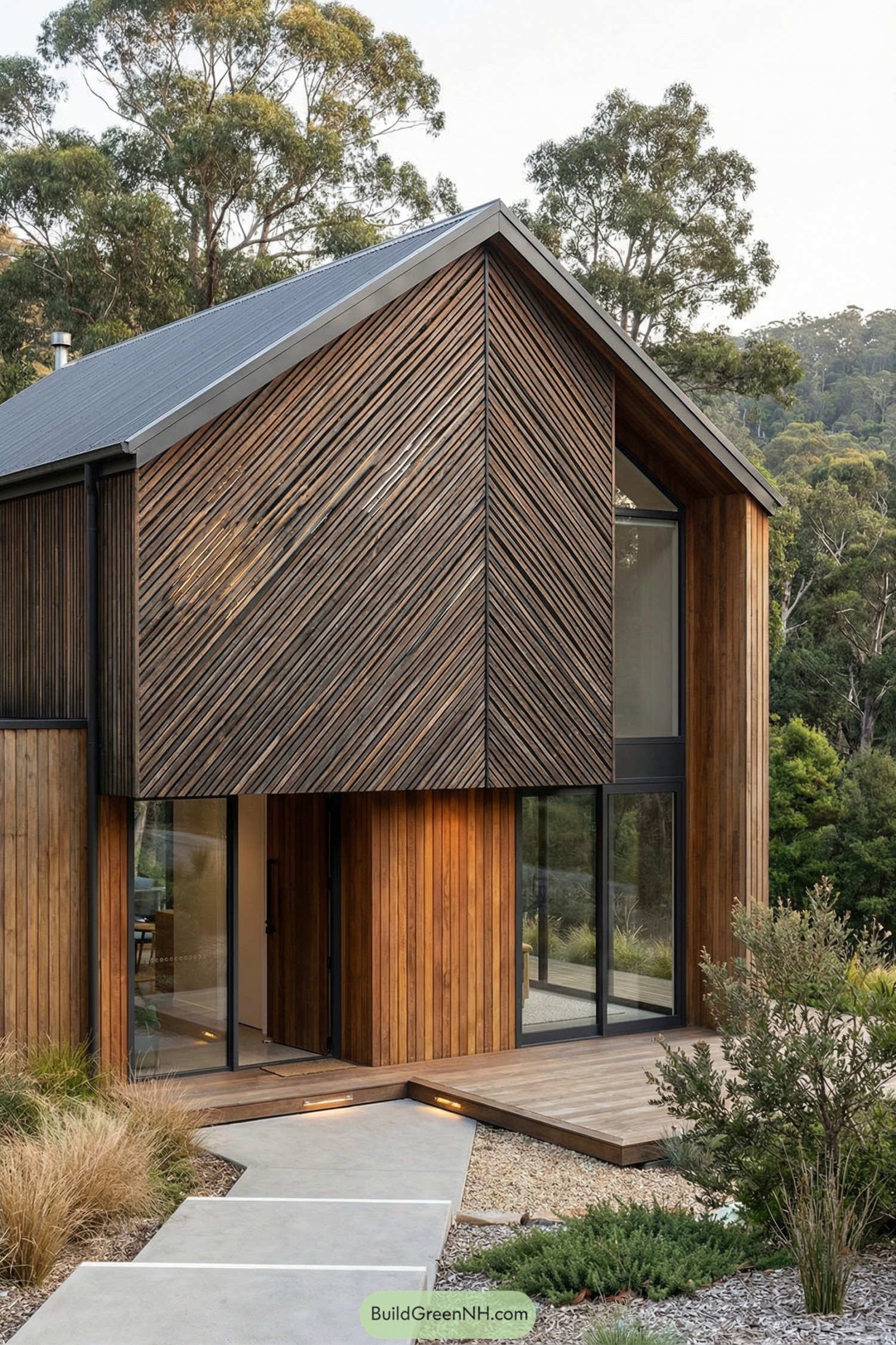 Modern wooden house with diagonal slat facade in a forest setting