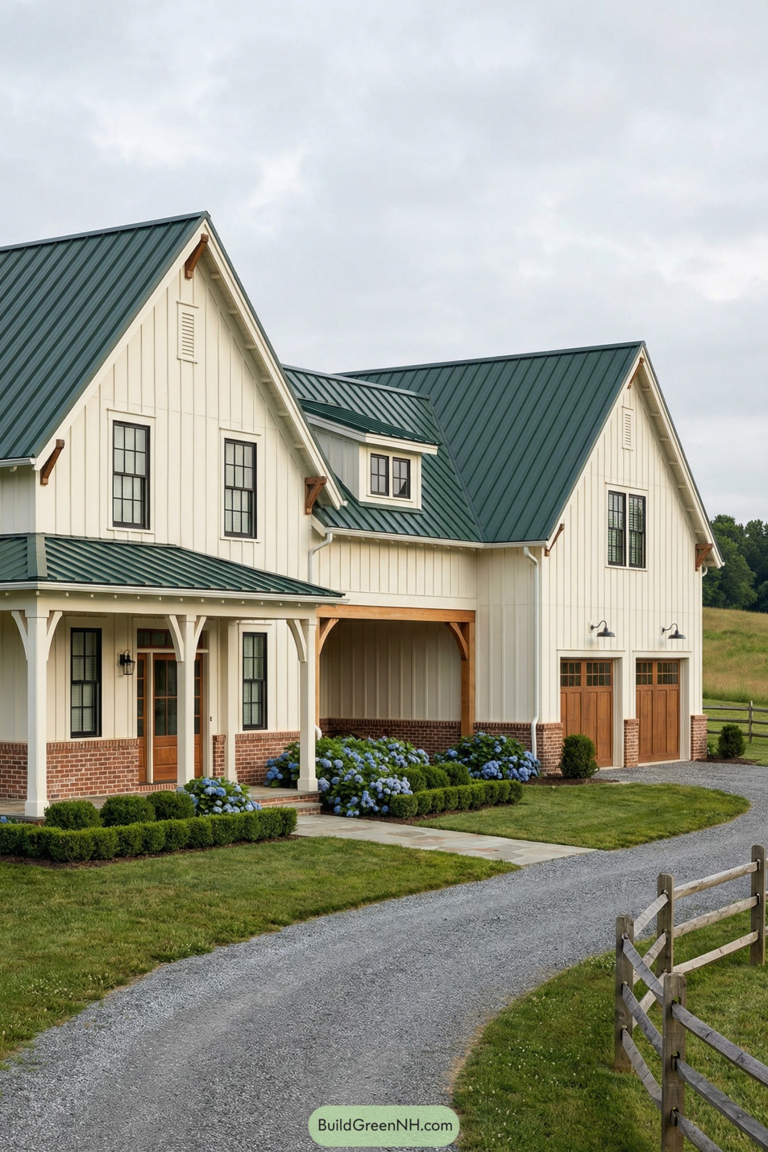Cream board and batten barndominium with green roof and open breezeway