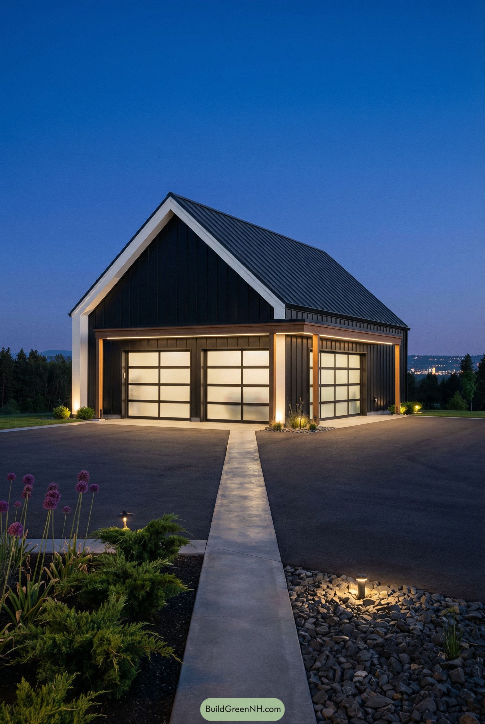 Modern black barn garage with glass doors at dusk