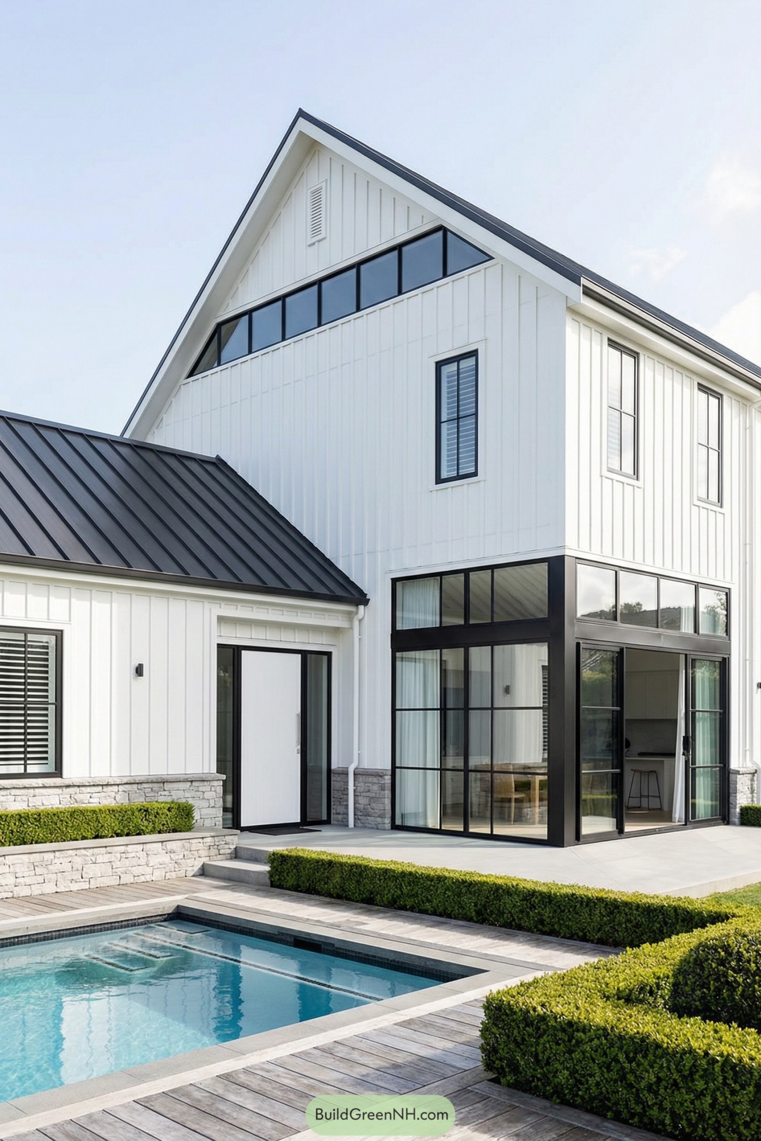 Modern white gabled house with pool