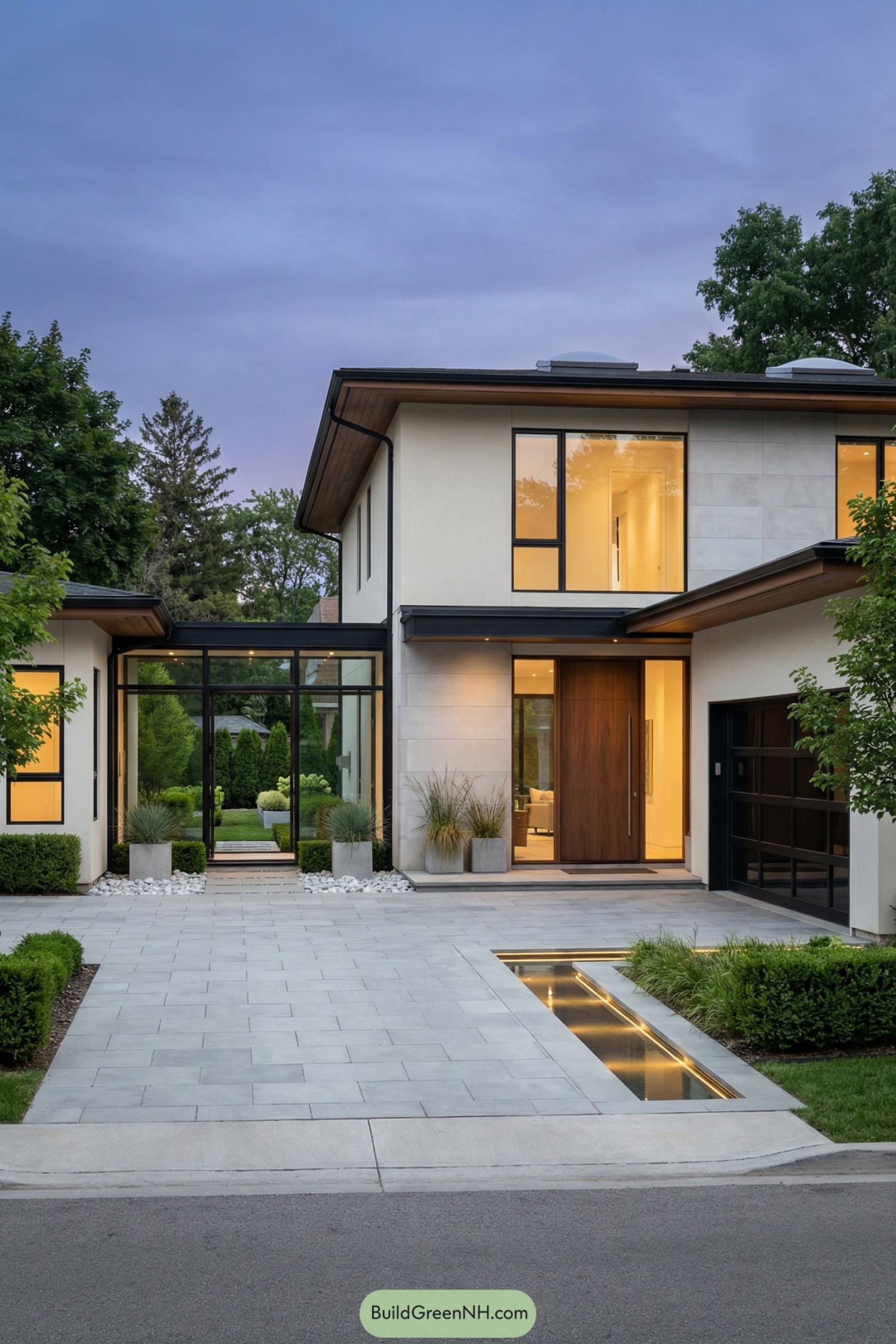 Modern two-story home with glass breezeway and attached garage