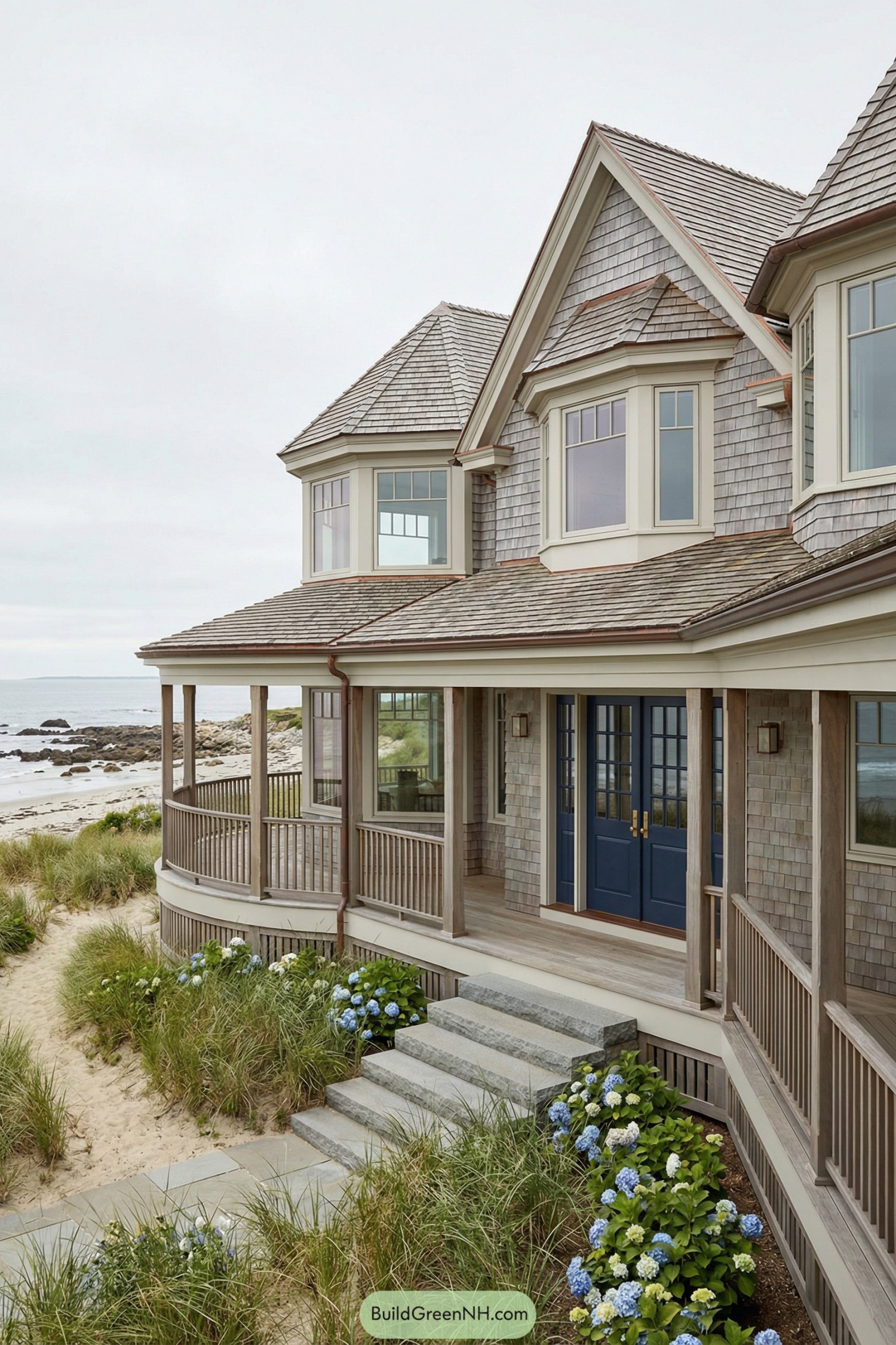 Coastal shingle house with wraparound porch overlooking the ocean