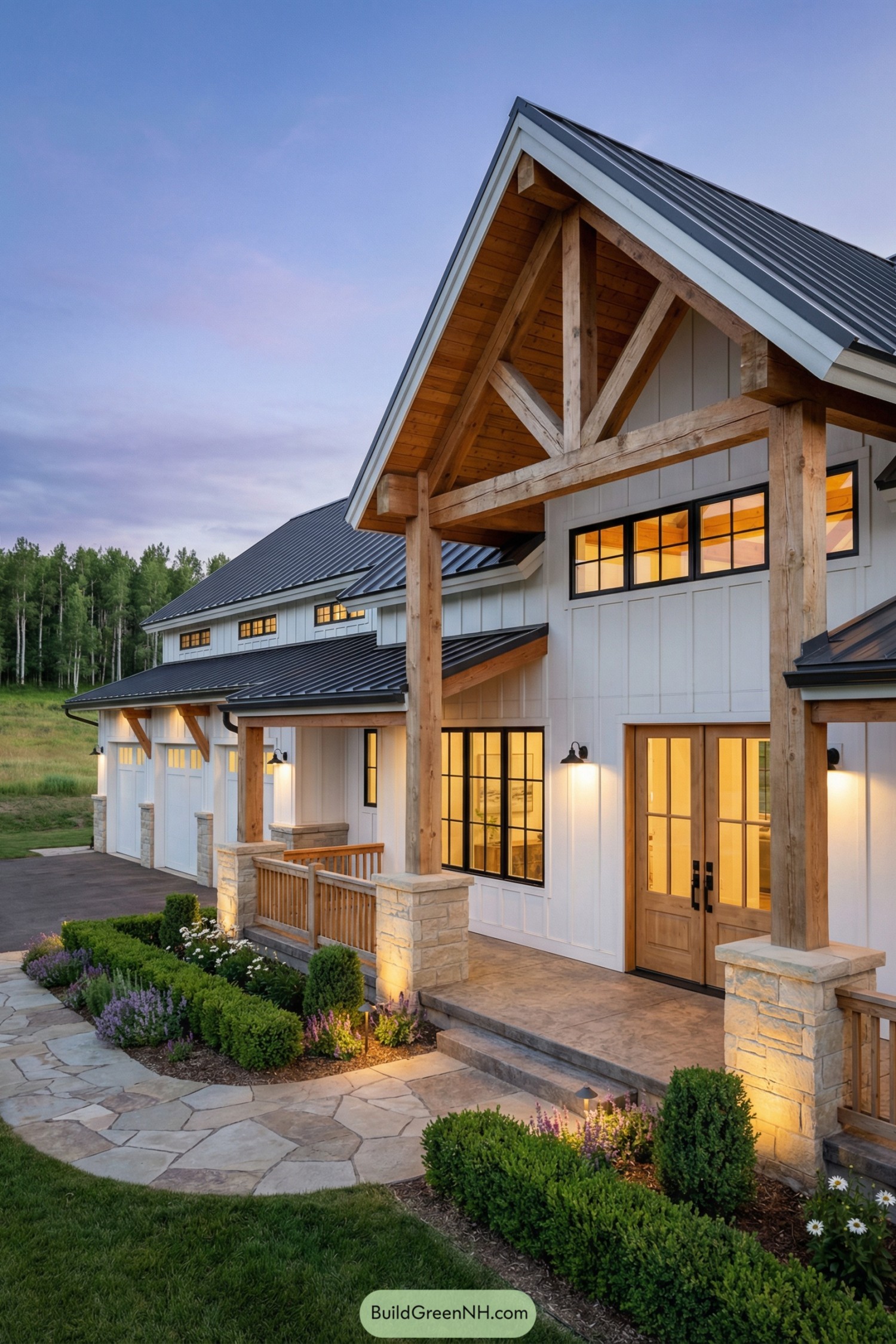 Modern farmhouse barndominium with timber porch and black metal roof