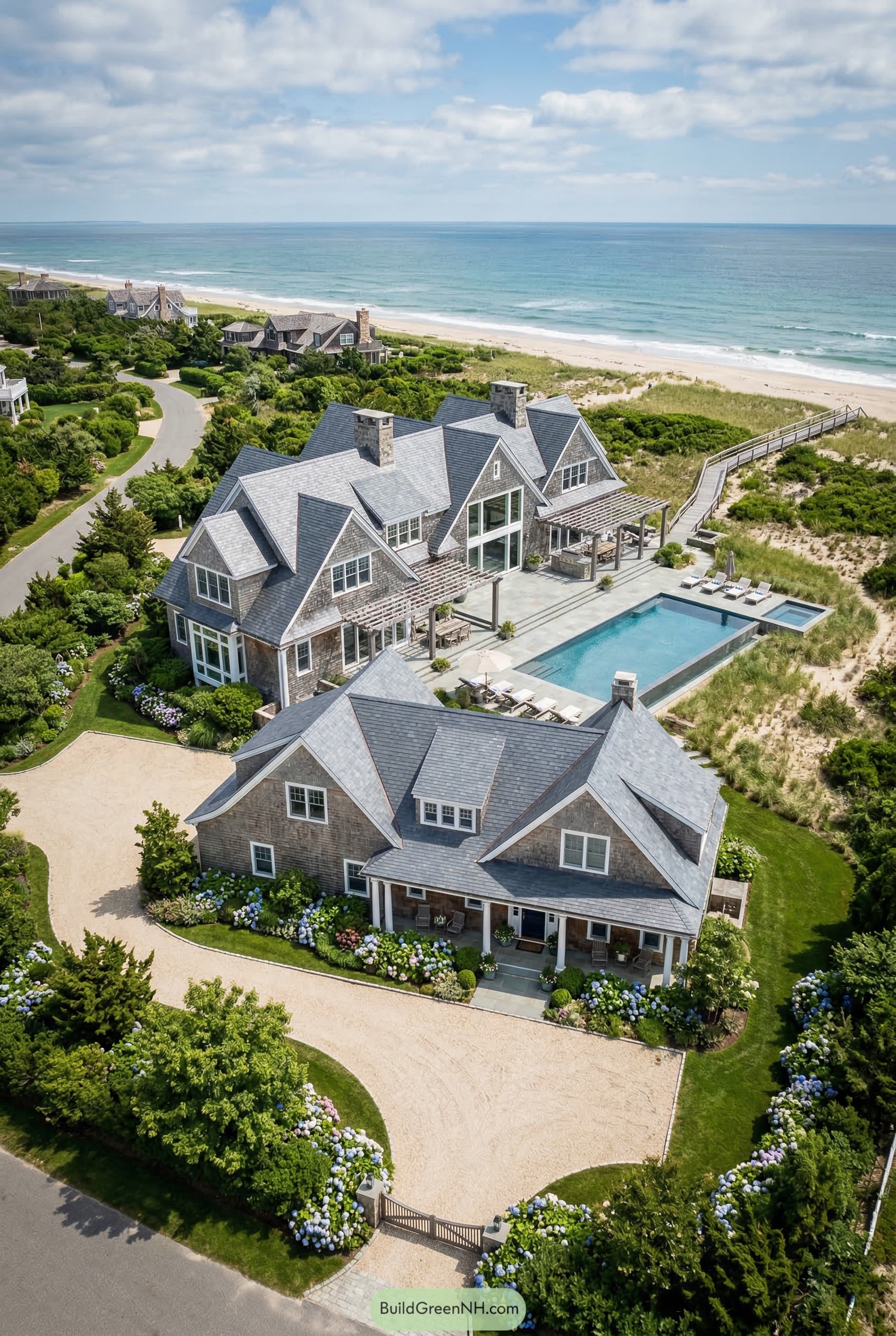 Beachfront shingle compound with pool and dunes