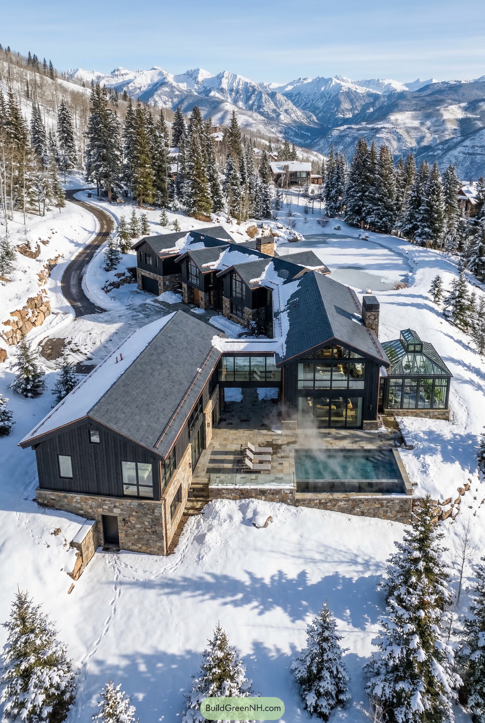 Snowy mountain mansion with steaming pool