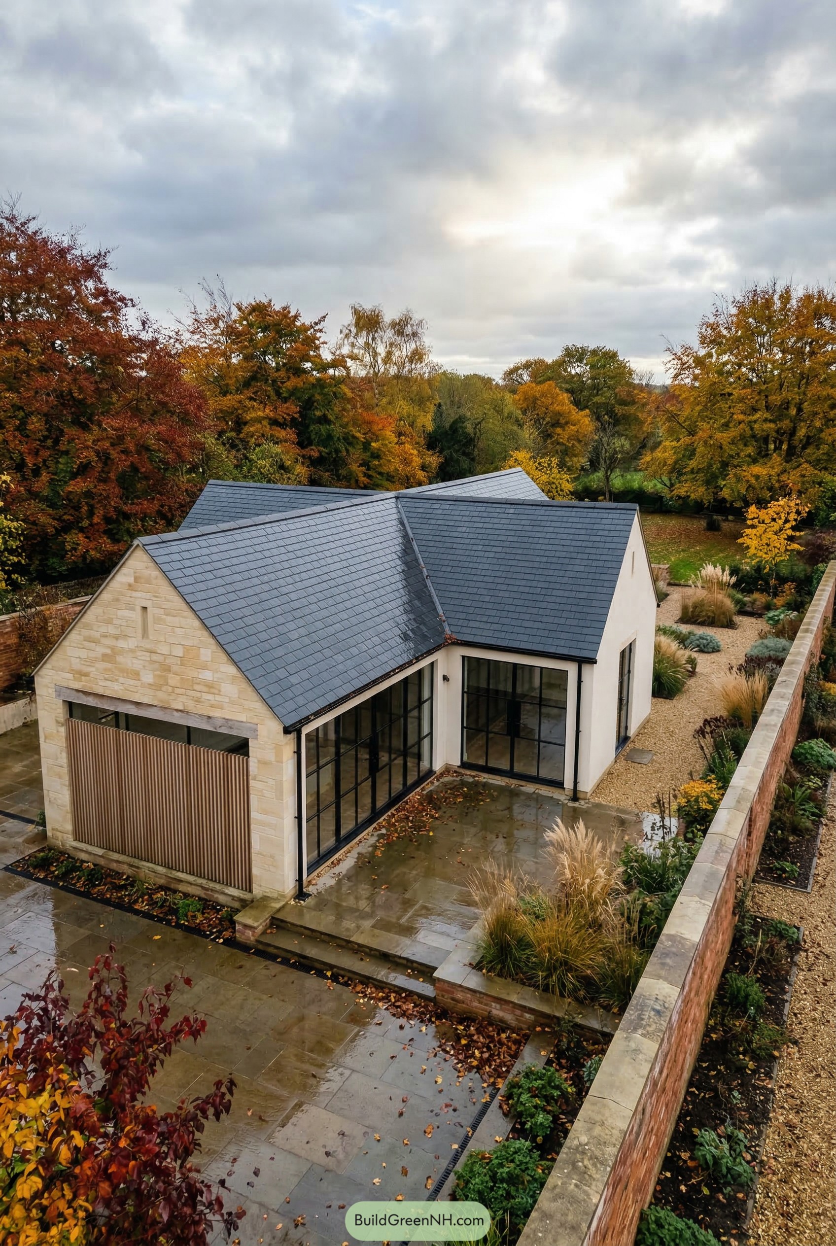Modern stone and render cottage with slate gables