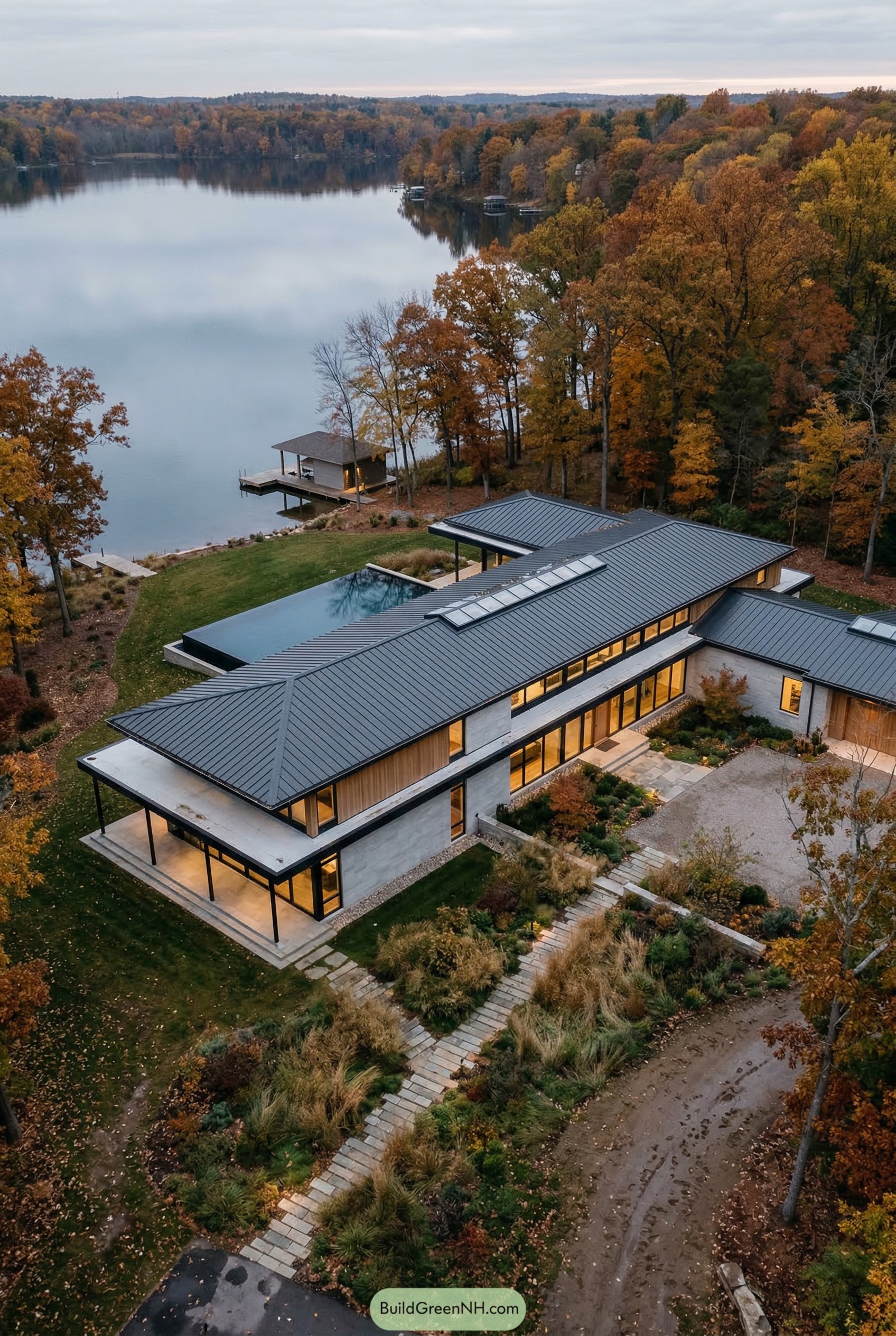 Modern lakefront ranch mansion with pool and dock