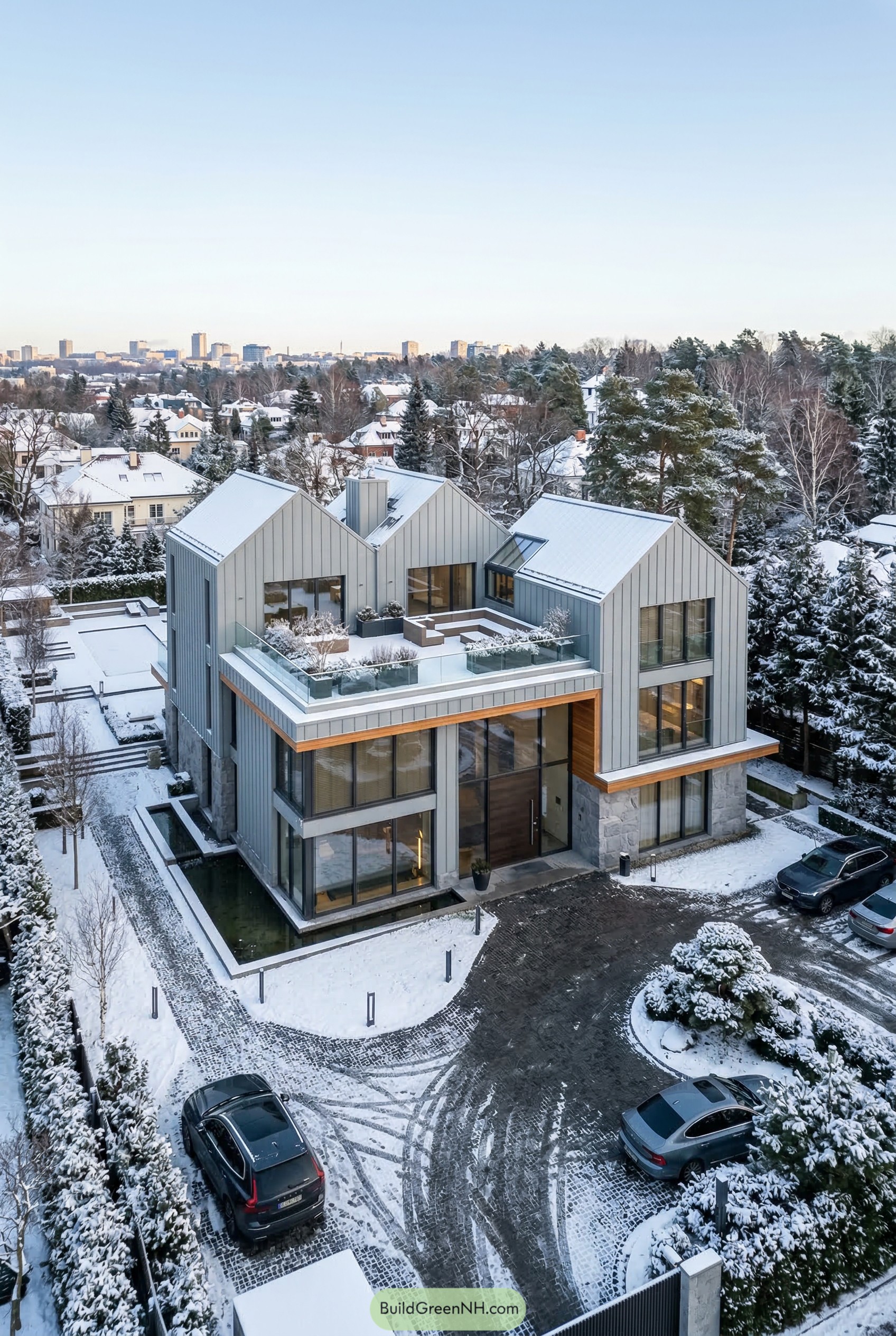 Modern three gable home with rooftop terrace in snow