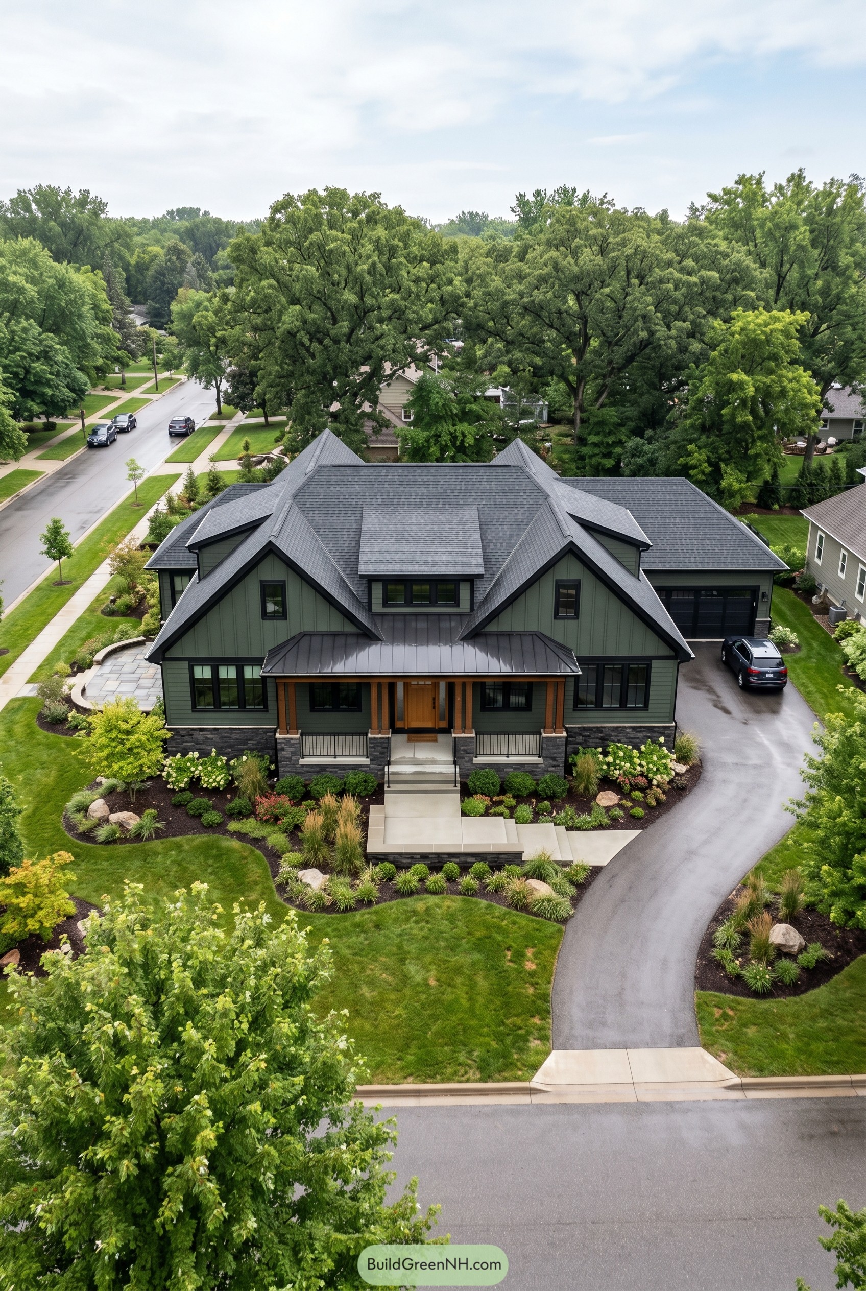 Dark green modern craftsman with layered gables