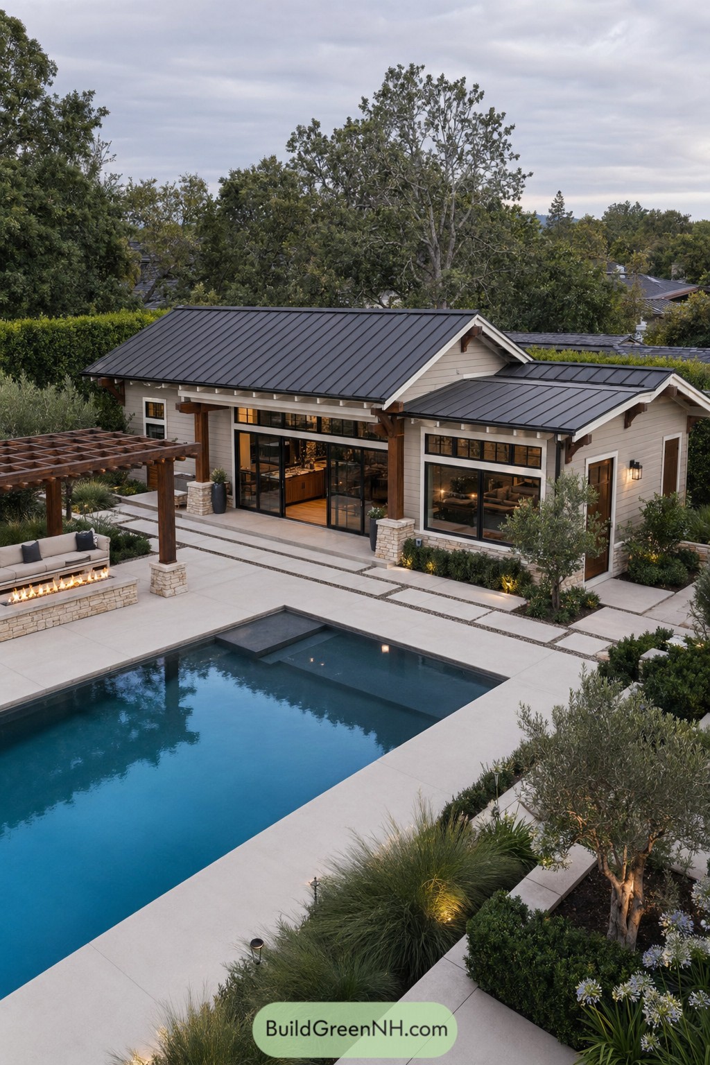Modern craftsman pool house beside a sleek backyard pool