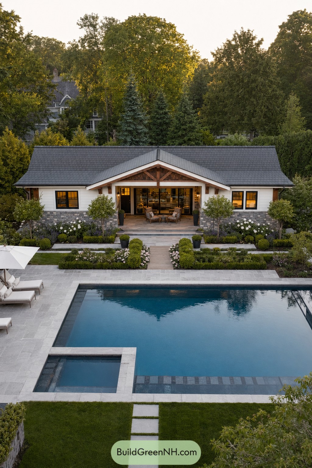 Modern craftsman pool house facing a rectangular pool