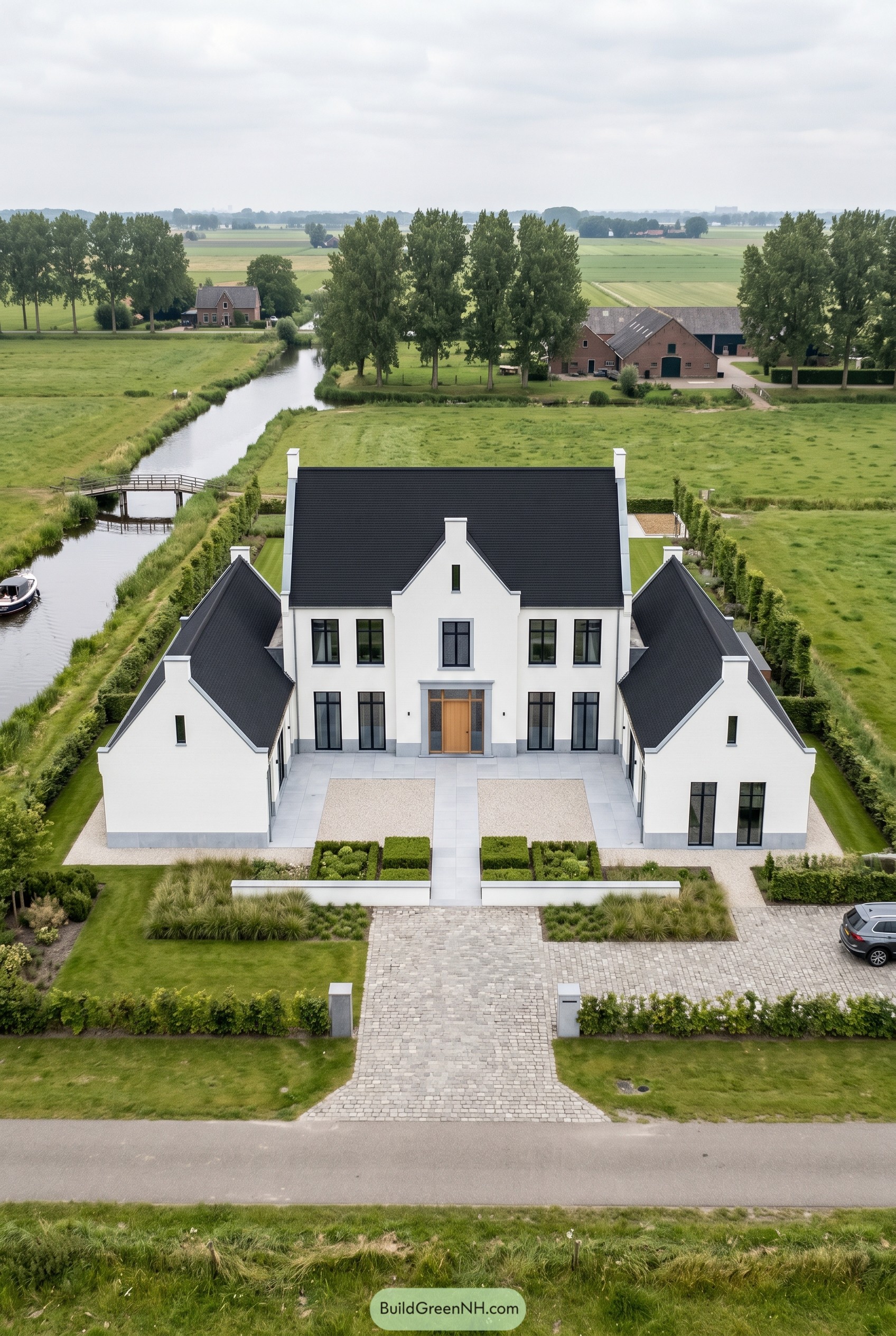 Symmetrical white villa with black gabled roof