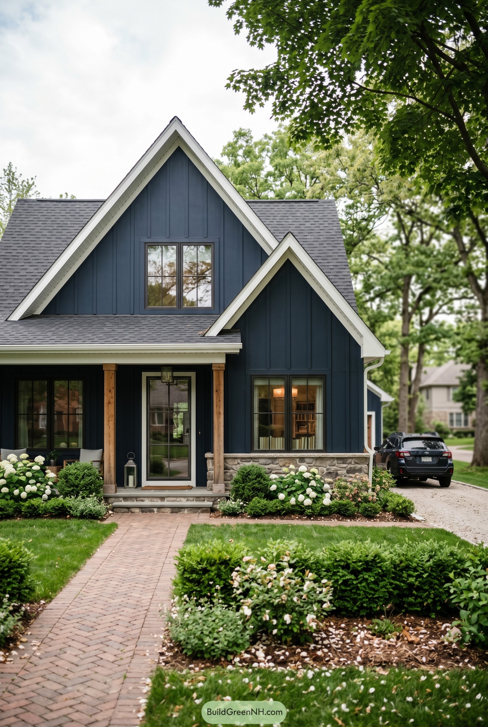Deep navy gabled house with white trim