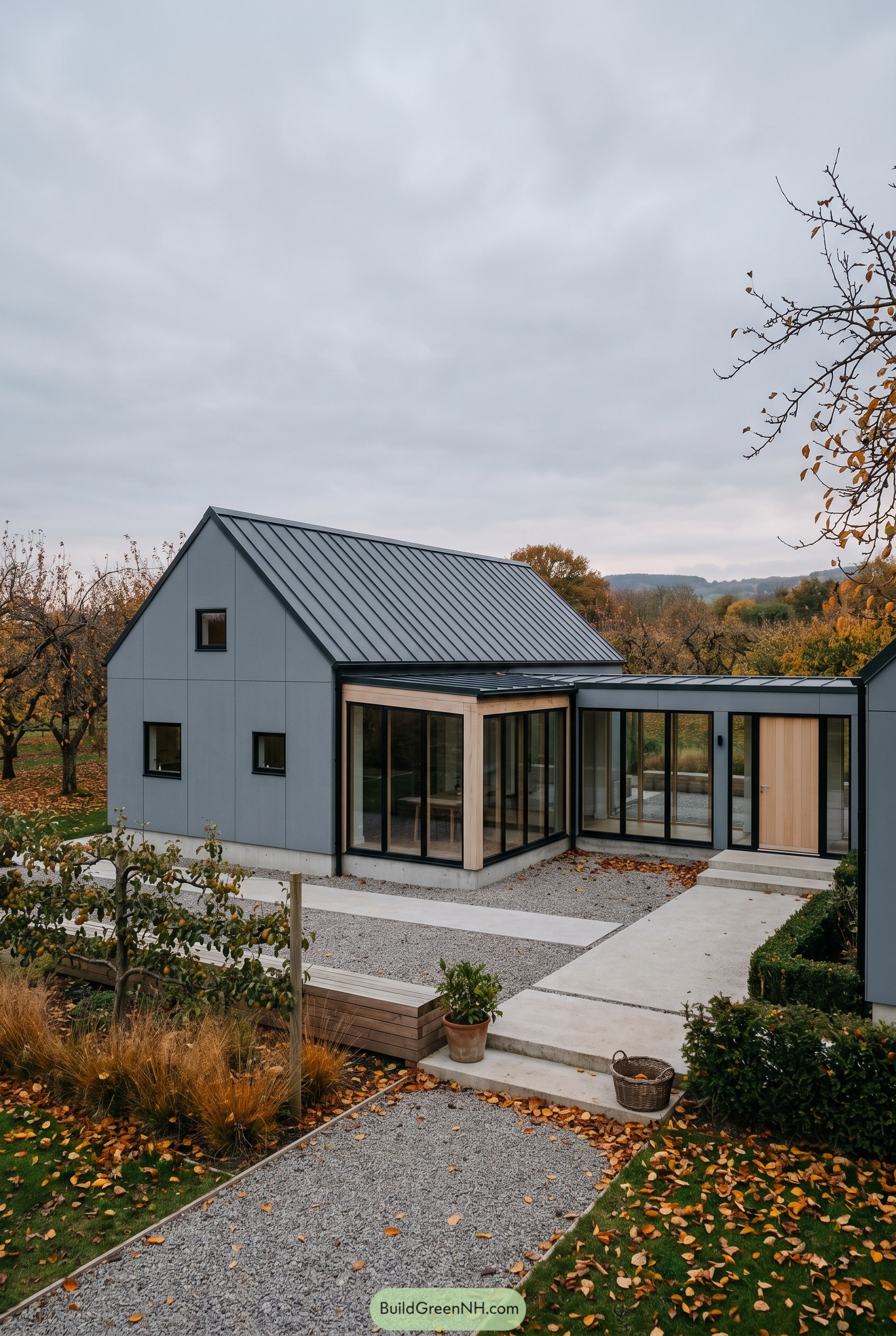 Gray barnhouse with corner glass sunroom