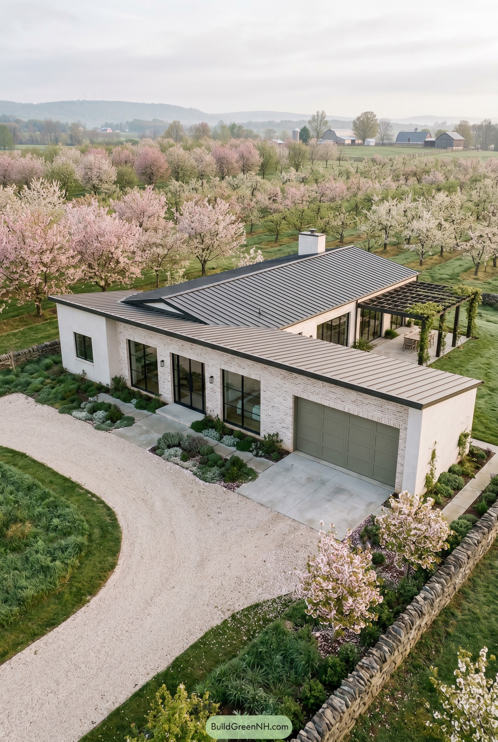 One story modern house with garage in blooming orchard