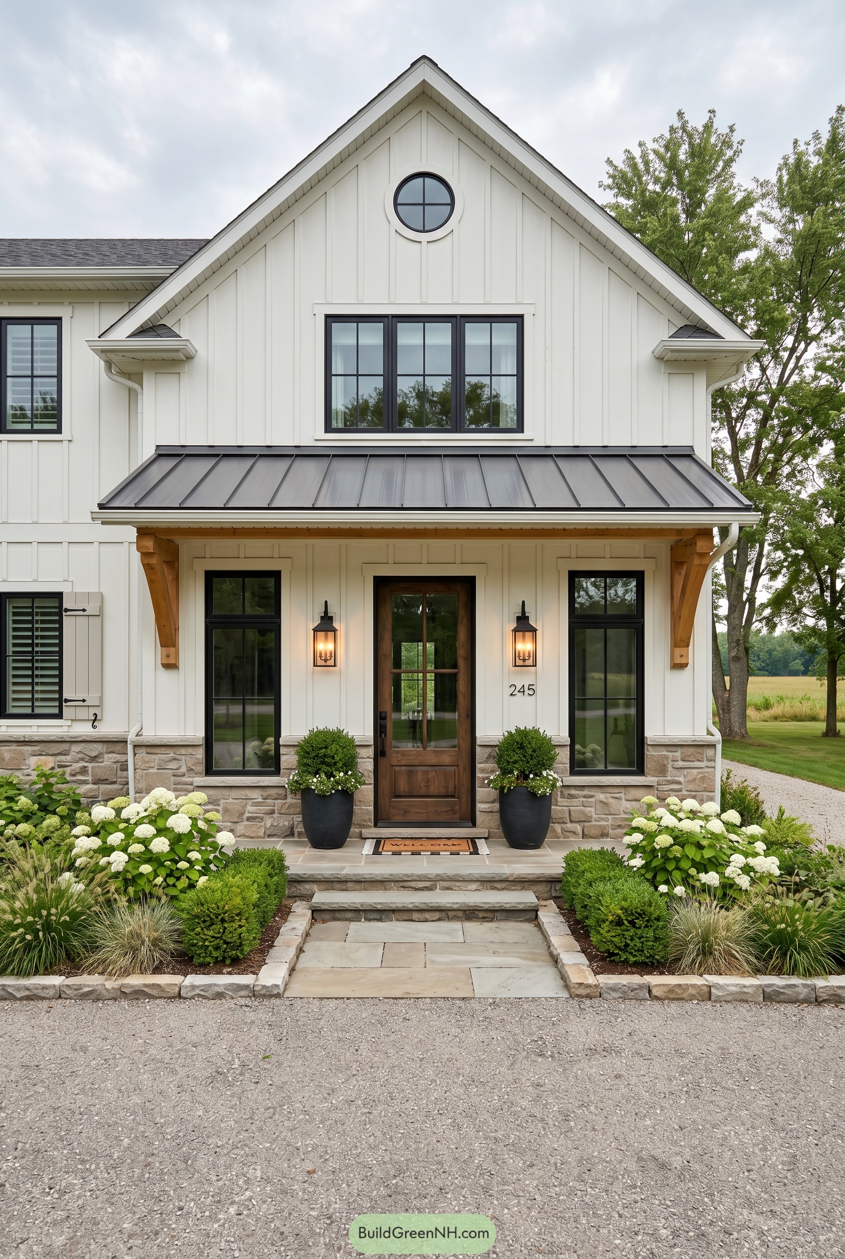 White farmhouse entry with metal awning