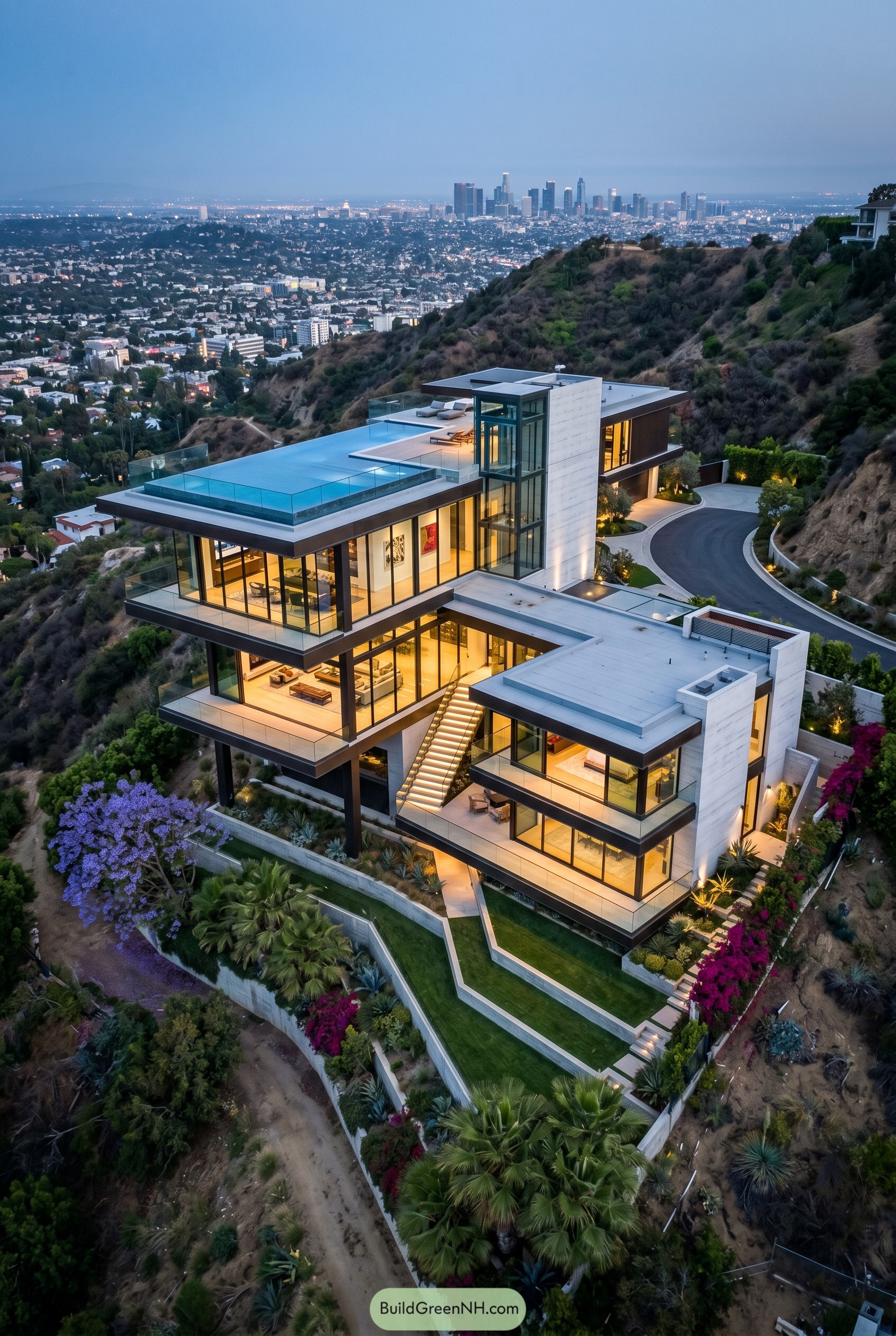 Modern glass hillside mansion overlooking the city