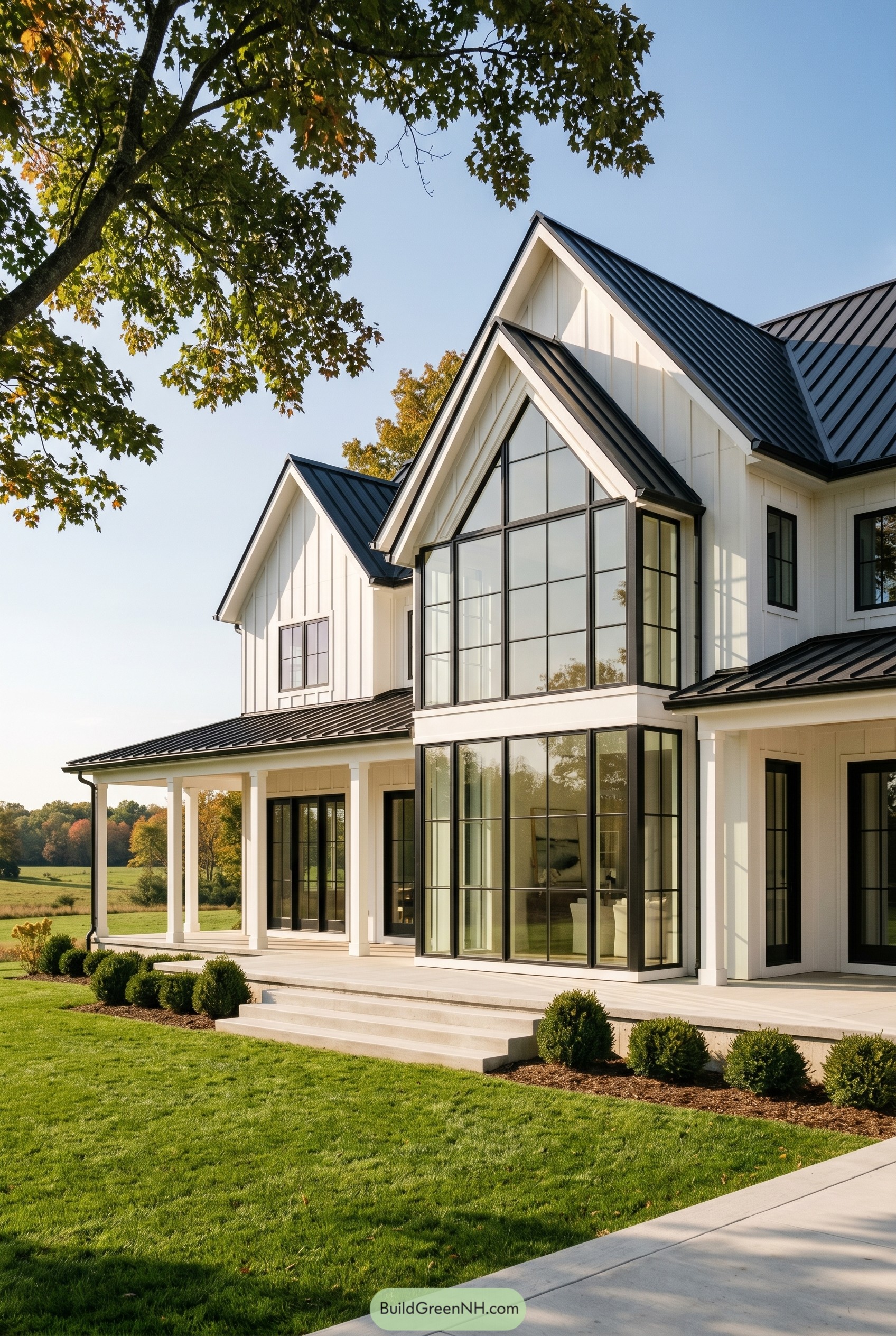 White modern farmhouse with black metal roof