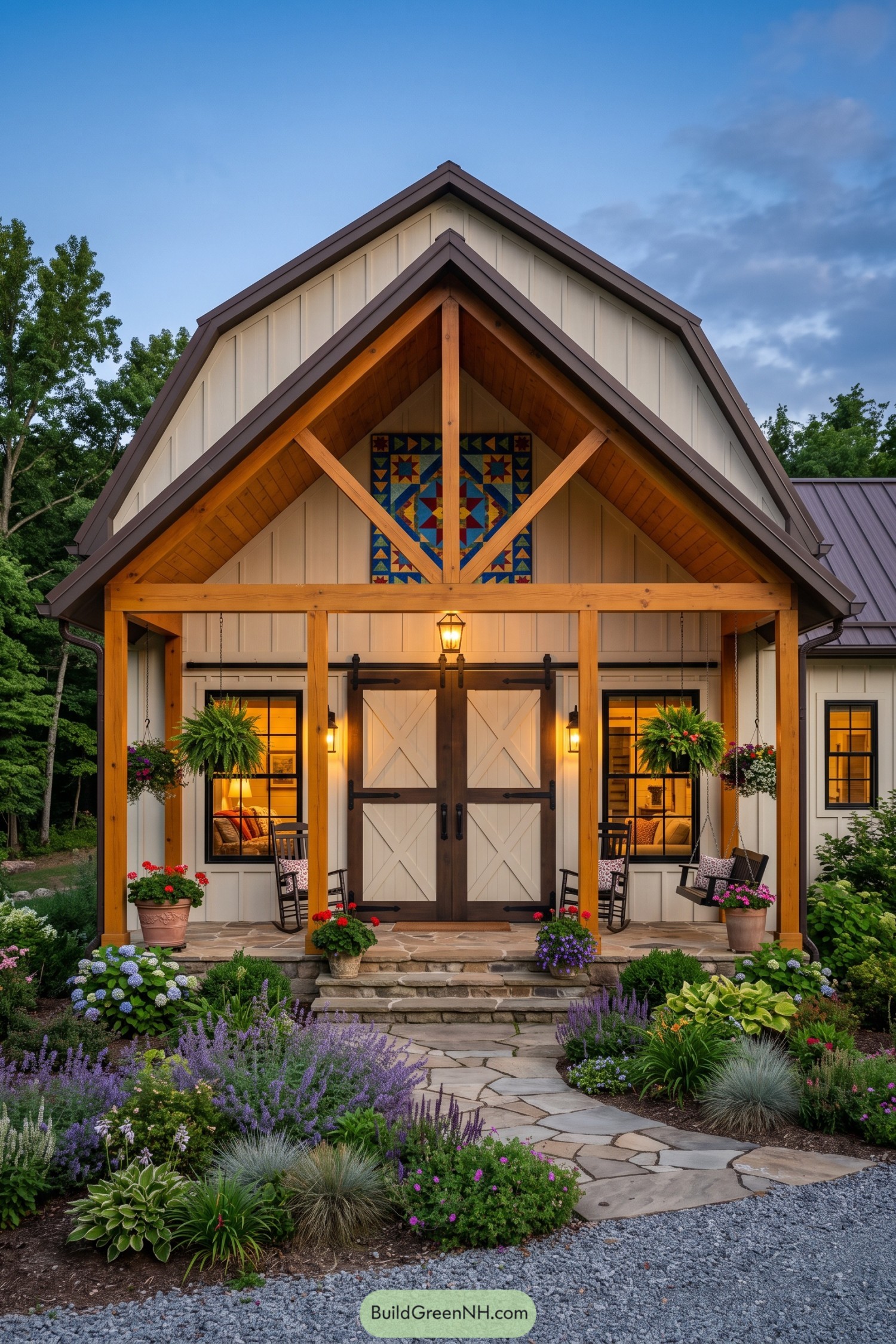 Gabled barndominium entry with quilt art and barn doors