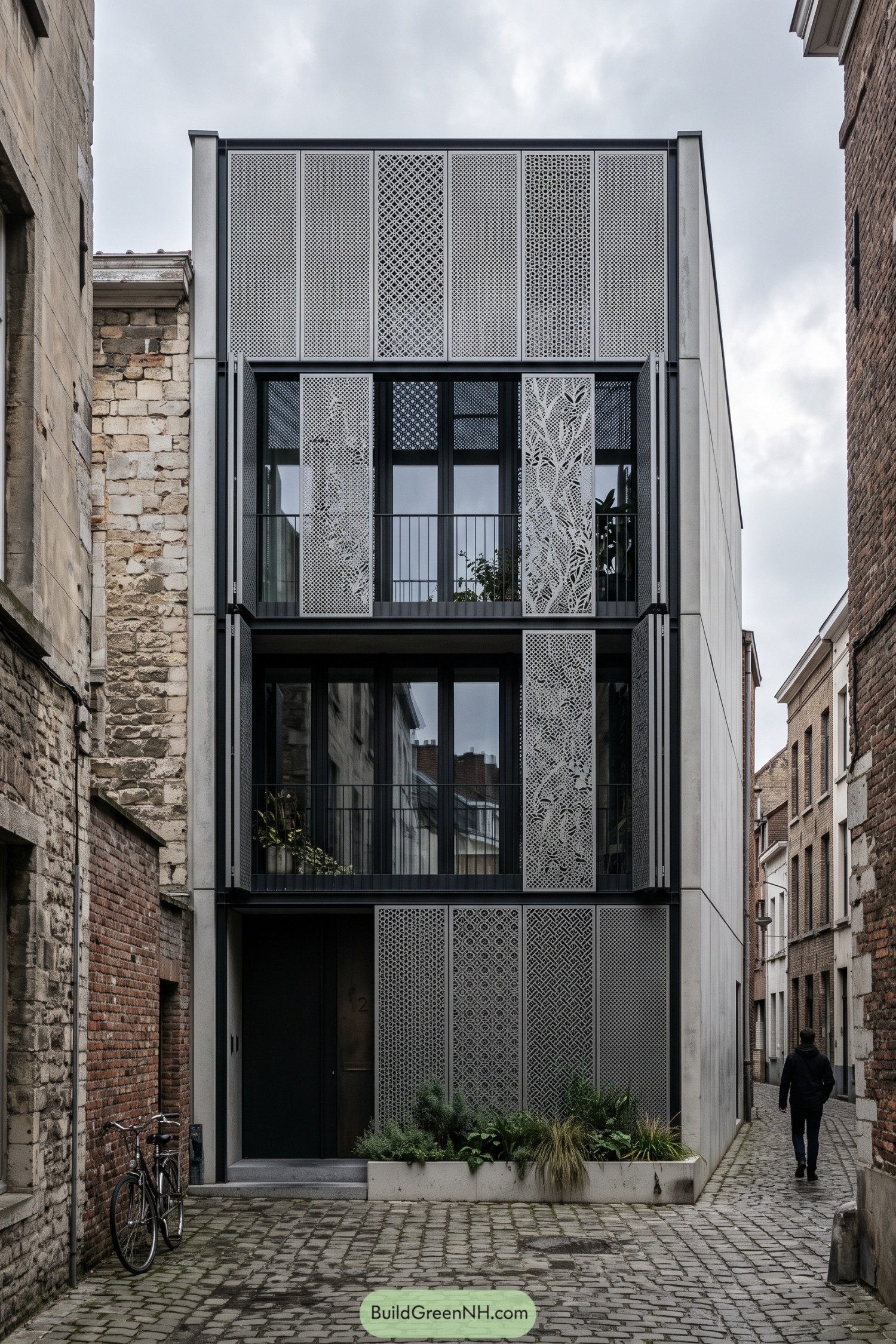 Four-storey home with perforated metal shutters in a narrow brick lane