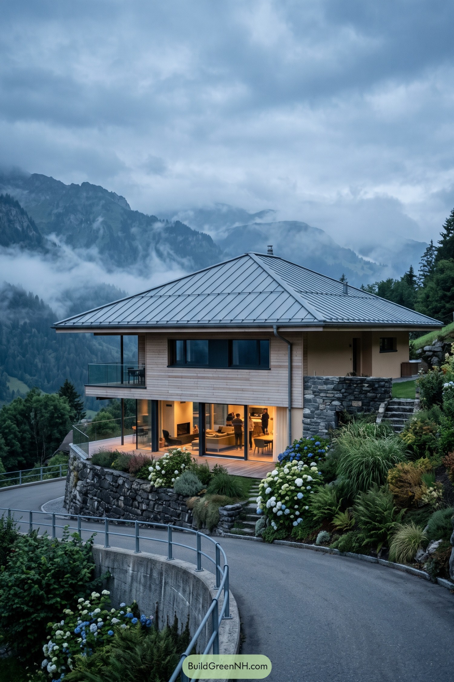 Modern hillside home with metal hip roof and glass terraces