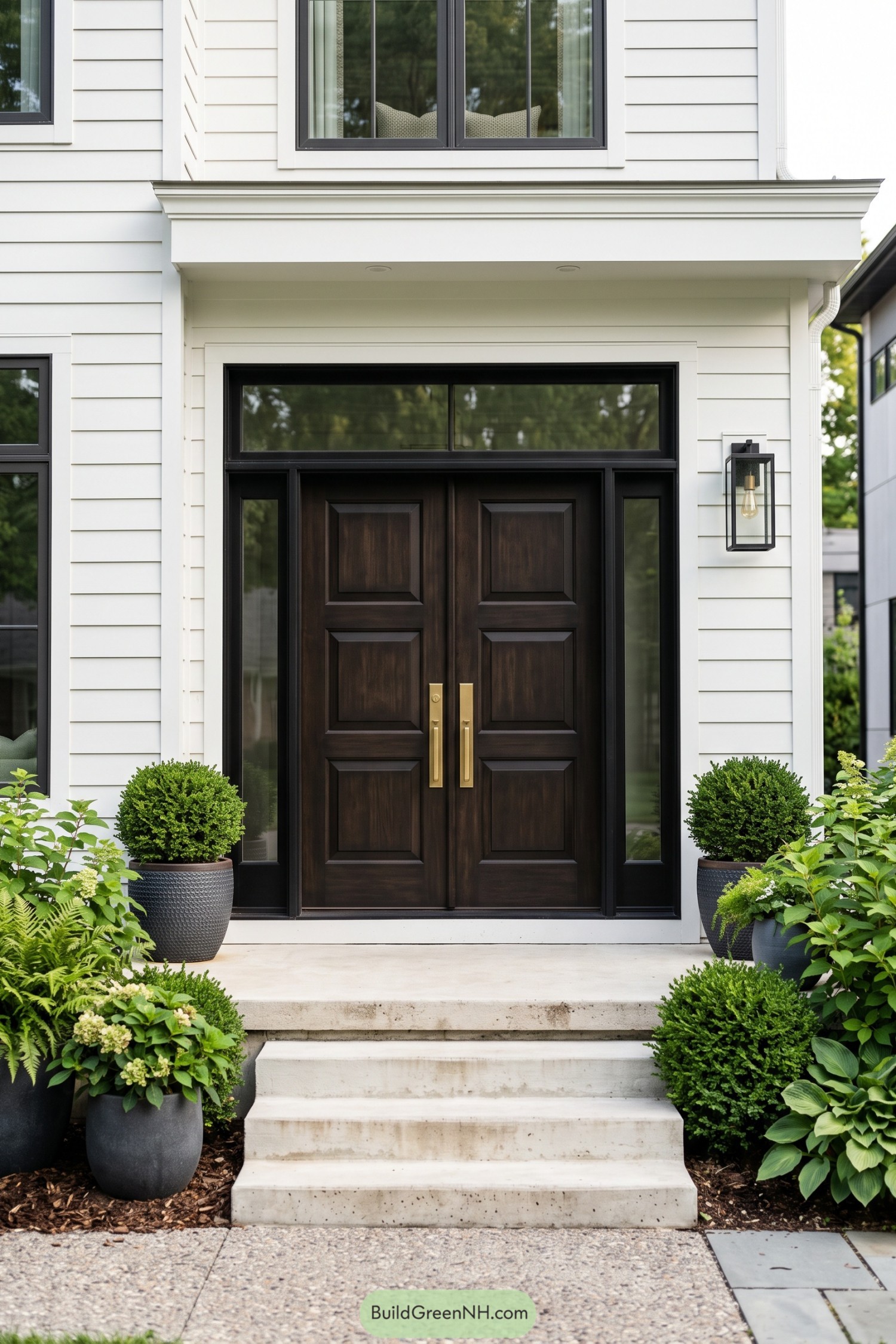 Dark wood double doors with brass pulls and black-framed glazing