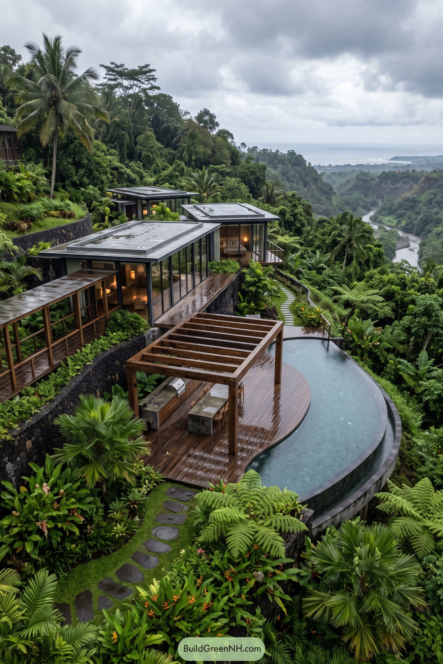 Glass villa with pool above tropical valley