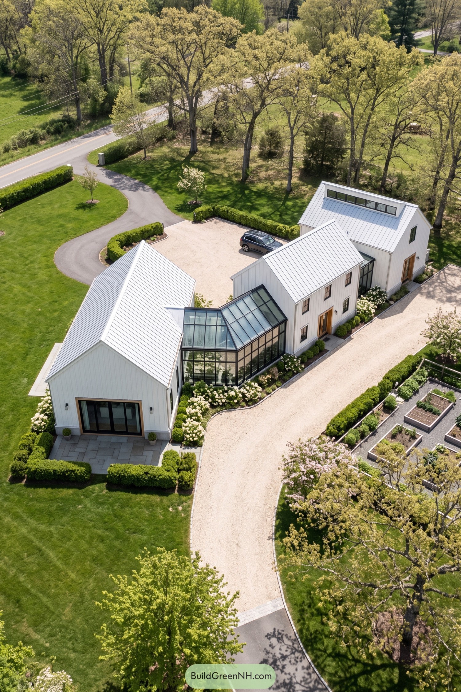 White barn home with glazed winter garden